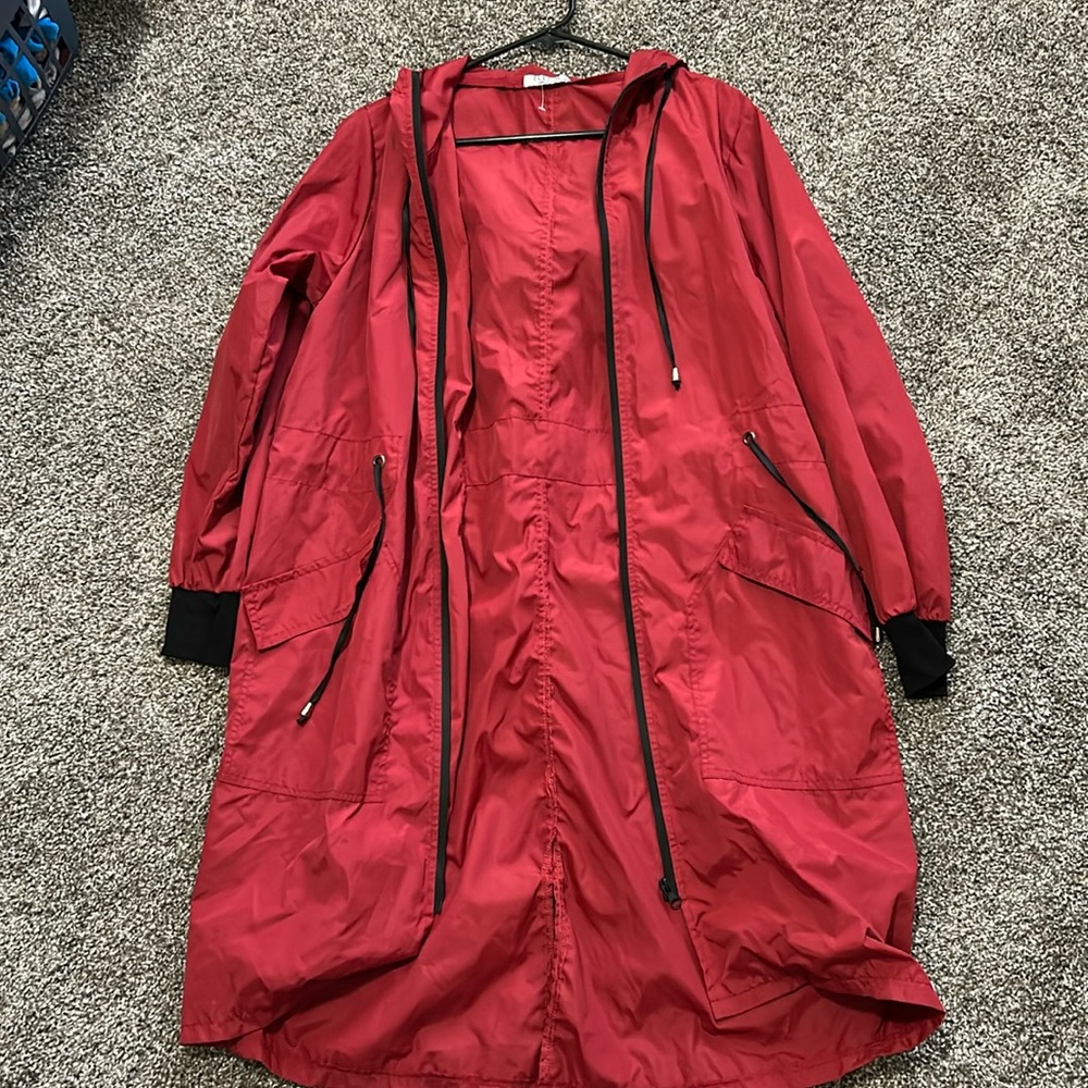 A light weight dark red windbreaker
